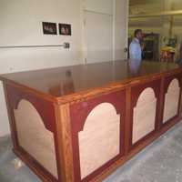 <p>Bill Kelley of Montrose, far right, takes a final look at the altar that three of his wood shop students built at Lincoln Hall Boys&#x27; Haven -- to be used by Pope Francis during this month&#x27;s Mass at Madison Square Garden. </p>