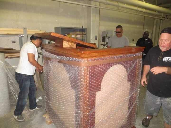 Movers put bubblewrap around a pulpit built for Pope Francis at Lincoln Hall Boys&#x27; Haven in Somers on Tuesday. The pulpit and altar are destined for Madison Square Garden&#x27;s Papal Mass on Sept. 25.