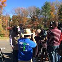 <p>Media swarm around Erin Moore, who knew Jeannette Navin of Easton, who has been missing along with her husband Jeffrey Navin since August.</p>