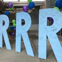 <p>Speakers left messages for students on the three R signs outside the Eisenhower Middle School in Wyckoff.</p>