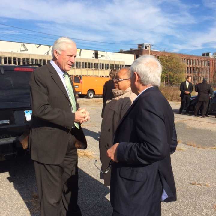 Bridgeport Mayor Bill Finch (left) talks with constituents during the last days of his term.