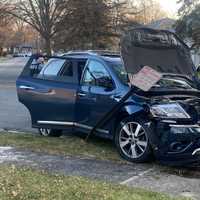 <p>A large contingent of police, firefighters and EMS units responded after the Nissan Pathfinder rounded a curve and crashed on narrow Marshall Street near Ridgewood High School late Friday afternoon Jan. 27.</p>