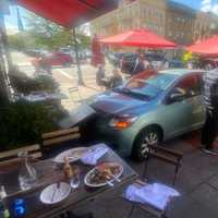 Lunching Couple Escape Injury When Unoccupied Car Rolls Into Raymond's In Ridgewood