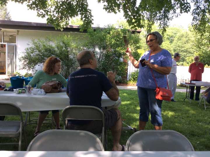 Locals interacting at the picnic