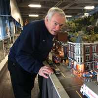<p>Bob Iuliucci oversees the model train running at the New Jersey Hi-Railers club in Paterson. </p>