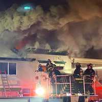 <p>At the scene of the Broad Avenue blaze in Ridgewood. (PHOTO: Boyd A. Loving)</p>