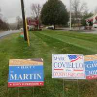 <p>Campaign signs near the Beekman Square Diner include support for Neil Martin, a Conservative-Democratic candidate for Town Supervisor who also is running on the &quot;We The People&quot; team seeking to oust Republican incumbents.</p>