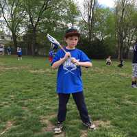 <p>A young lacrosse player readies for a catch.</p>