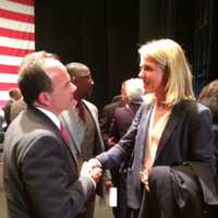 <p>U.S. Rep. Jim Himes&#x27; wife, Mary, greets Bridgeport Mayor Joe Ganim after his swearing-in ceremony Tuesday. </p>