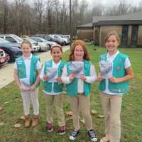 <p>Girl Scouts who handed out Veterans Day Ceremony programs on Wednesday outside Wappinger Town Hall included, from left, Rebecca Propfe, Sara Mrani, Jackie Gallman and Shannon Kenney. They are fifth-grade students at Sheafe Road Elemenary School. </p>