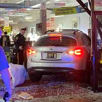 <p>A tow truck driver backed the Infiniti out of the Prestige Furniture store in the Elmwood Park Shopping Center on Broadway (Route 4).</p>