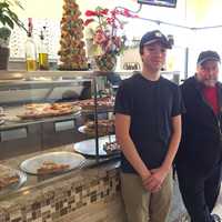 <p>Calabria Pizza owner Franco Vaccaro, right, with his son, Gianfranco, 19.</p>