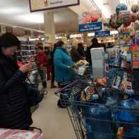 <p>Long lines greeted patrons at a grocery store in Port Chester ahead of time</p>