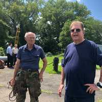 <p>Museum officials Leslie Altschuler (right) and Jack Brown noticed some of the guns on deck were out of place and hatches were open when they arrived Tuesday at the museum.</p>