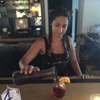 <p>Pouring sangria at NoMa Social in New Rochelle.</p>