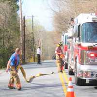 Mahopac Brush Fire Sandwiched On Tree Line Threatens Home