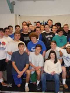 Darien High School Football Team Lifts For A Good Cause