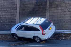 SUV Mounts Route 17 Guardrail