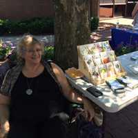 <p>Robin Reenstra-Bryant sold heirloom seeds for The Rutherford Museum on opening day of the farmers market. Actual Produce should arrive next week.</p>