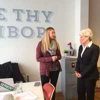 <p>Community organizer Sarah Lewis speaks with Lt. Gov. Nancy Wyman at B:Hive Bridgeport.</p>