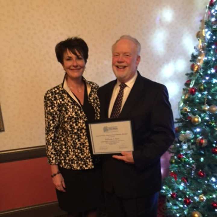 LifeBridge CEO William Hass poses with St. Vincent&#x27;s Medical Center Senior Vice President Dianne Auger.