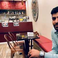 <p>Chirag Trivedi in TimeOut Cafe on River Edge Avenue in New Milford.</p>