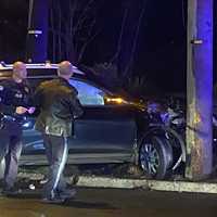 SUV Slams Into Pole Off Route 208