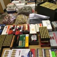 <p>Ammunition and other things seized from an Aldine Avenue home Saturday</p>