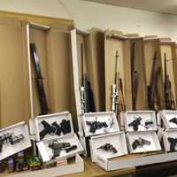 <p>Weapons seized Saturday night from an Aldine Avenue home.</p>