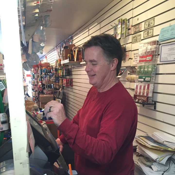 Rob Martin sells Powerball tickets at East Putnam Variety in Greenwich.