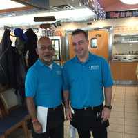 <p>Two waiters pose in the dining room at Orem&#x27;s Diner in Wilton.</p>