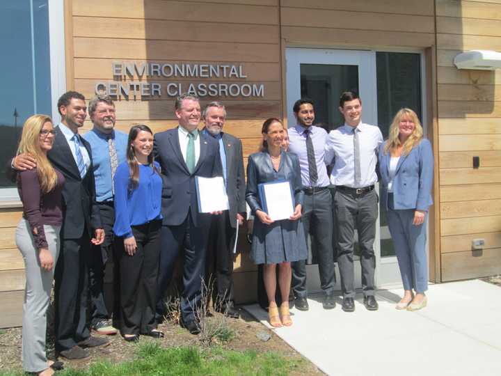 Pace students and faculty pose with Senator Terrence Murphy, Assemblywoman Amy Paulin and Mayor Peter Scherer after presenting a bill to ban elephants from being used as entertainment acts in New York.