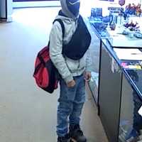 Long Island Robbery Suspect On Run After Shooting Store Employee, Police Say