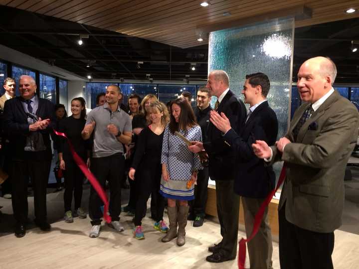 Local dignitaries and BDx Fitness staff celebrate its grand re-opening in Shelton.