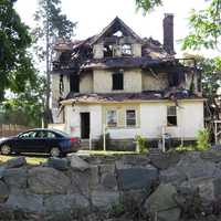 <p>Fire tore through this Hamilton Avenue home in New Rochelle.</p>