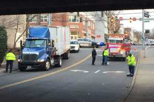 Truck Gets Wedged Under Railroad Overpass In Greenwich