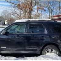 <p>A photo released by police of the vehicle, a 2008 black Madza Tribute, Sherman Roberts Jr. was driving when he took his girlfriend’s 2-year-old child, Dio Palermo, on Saturday, Feb. 13.</p>