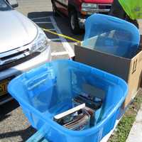 <p>Several boxes of photos were salvaged from the New Rochelle home.</p>