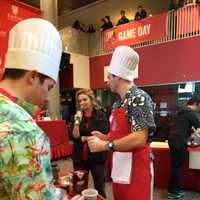 <p>&quot;Iron Chef&quot; Judge Donatella Arpaia talks with members of Team Kostka at Fairfield University&#x27;s students meatball competition.</p>