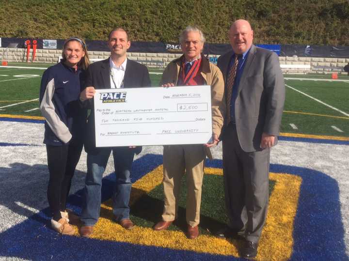 Alyssa Zeoli, John Paine, Dr. Anthony C. Cahan, and Mark Brown are on hand for the presentation.