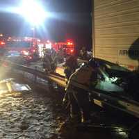 <p>Fairfield Firefighters work at the scene of the multi-vehicle crash on I-95 early Tuesday.</p>