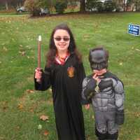 <p>Ginny Weasley and Batman march in the Briarcliff Ragamuffin Parade.</p>