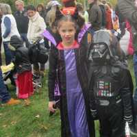 <p>Maleficient and Darth Vader march in the Ragamuffin Parade.</p>