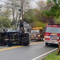 <p>The SUV landed on its side on East Glen Avenue in Washington Township.</p>