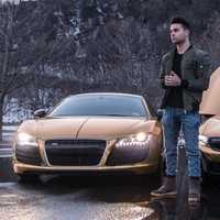 <p>Edgewater&#x27;s Coby Persin and two of his chrome supercars.</p>