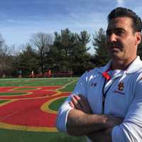 <p>Bergen Catholic&#x27;s lacrosse strength and conditioning coach Richard Robinson stands on the Crusaders&#x27; field.</p>