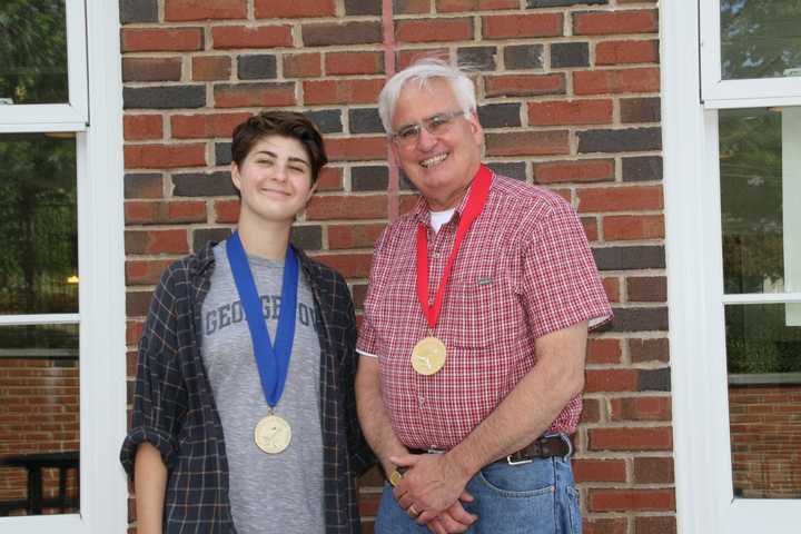 Pleasantville High School Student Achievements student Emily Harter and her art teacher Jim Maron.