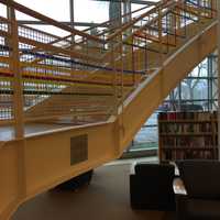 <p>Artist Katherine Daniels created an art installation of colorful plastic strips woven into the gridded surround of Greenwich Library&#x27;s grand stairs.</p>