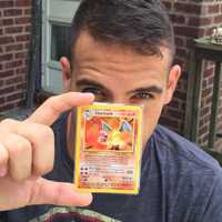 <p>Greg DiGuglielmo of Fair Lawn holds up a beloved Charizard. He hopes to soon catch one on Pokemon Go.</p>