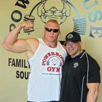 <p>Erik Santiago of South Hackensack, right, with former WWE and UFC champion Brock Lesnar.</p>